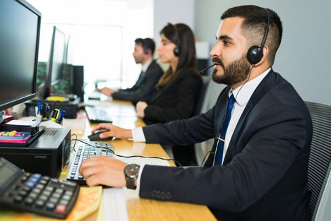 Professional back office support team member with headset